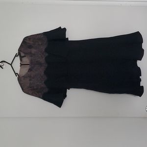 BCBC black cocktail dress with lace and ruffle detail. Size 2.